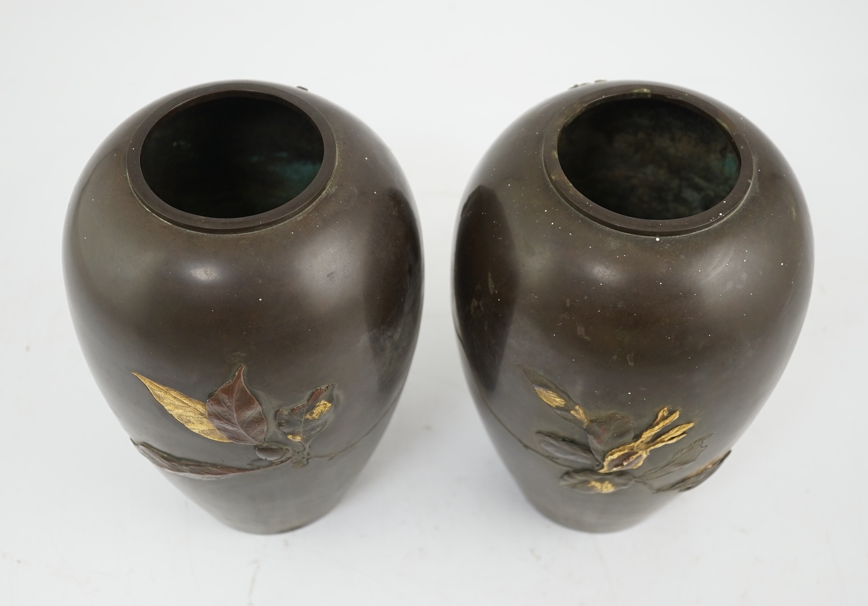 A pair of Japanese bronze and mixed metal ovoid vases, Meiji period